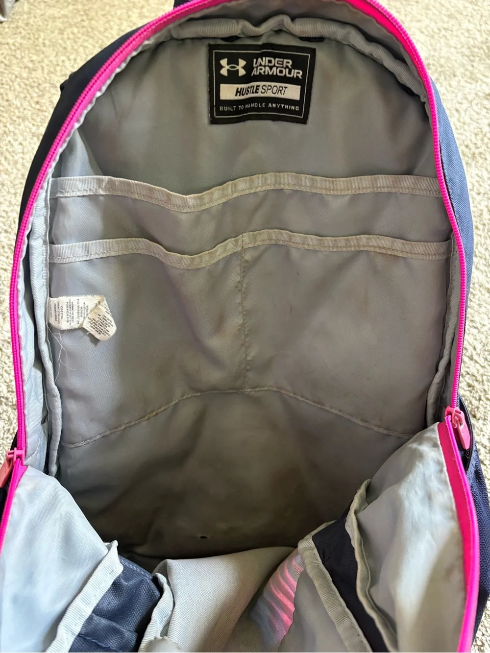 Under Armour Navy Backpack with Pink Trim and Blue Accents